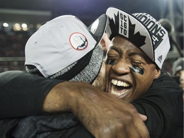 Ottawa Redblacks quarterback Henry Burris (1) celebrates after defeating the Calgary Stampeders during overtime CFL Grey Cup football action on Sunday, November 27, 2016 in Toronto.