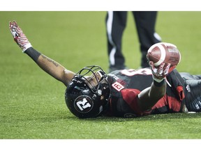 Ottawa Redblacks wide receiver Ernest Jackson (9) celebrates after scoring a touchdown against the Calgary Stampeders during overtime CFL Grey Cup football action on Sunday, November 27, 2016 in Toronto.