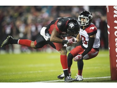 Ottawa Redblacks wide receiver Ernest Jackson (9) scores the deciding touchdown against the Calgary Stampeders during overtime.