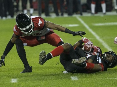 Ottawa Redblacks wide receiver Ernest Jackson (9) slides in to pick up fumble to keep drive alive  during CFL Grey Cup action in Toronto, Ont. on Sunday November 27, 2016. Craig Robertson/Toronto Sun/Postmedia Network