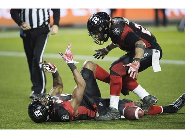 Ottawa Redblacks wide receiver Ernest Jackson, left, celebrates his touchdown with teammate running back Kienan Lafrance during overtime CFL Grey Cup football action on Sunday, November 27, 2016 in Toronto.