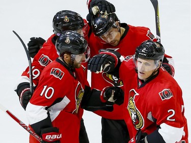 Ottawa Senators defenseman Dion Phaneuf (2) is congratulated on his first period goal against the Carolina Hurricanes during NHL hockey action at Canadian Tire Centre in Ottawa on Tuesday November 1, 2016. Errol McGihon/Postmedia