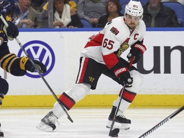 Ottawa Senators' Erik Karlsson (65) skates with the puck during the first period of an NHL hockey game against the Buffalo Sabres, Wednesday, Nov. 9, 2016, in Buffalo, N.Y.
