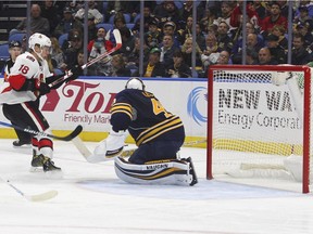 Ottawa Senators' Ryan Dzingel (18) puts the puck past Buffalo Sabres goalie Robin Lehner (40) during the second period of an NHL hockey game, Wednesday, Nov. 9, 2016, in Buffalo, N.Y.