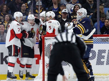 Ryan Dzingel #18 of the Ottawa Senators celebrates with his team after scoring on Robin Lehner #40 of the Buffalo Sabres during the second period at the KeyBank Center on November 9, 2016 in Buffalo, New York.