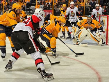 NASHVILLE, TN - NOVEMBER 08:  Filip Forsberg #9 of the Nashville Predators and Derick Brassard #19 of the Ottawa Senators watch Ryan Ellis #4 stop a puck in front of goalie Pekka Rinne #35 during the second period at Bridgestone Arena on November 8, 2016 in Nashville, Tennessee.