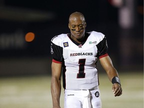 Ottawa's Henry Burris leaves the field not with the result he wanted on his return to play against the Tiger-Cats his former team. Ottawa Redblacks lose to Hamilton Tiger-Cats 33 to 23  during CFL action in Hamilton  Ont. on Saturday July 26, 2014.