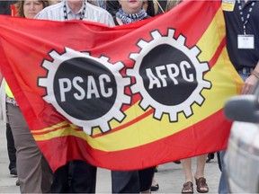 PASC members march at a Winnipeg rally in this file photo.