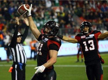 Patrick Lavoie of the Ottawa Redblacks celebrates a touchdown against of the Calgary Stampeders during the 104th Grey Cup at BMO Field in Toronto, Ont. on Sunday November 27, 2016. Dave Abel/Toronto Sun/Postmedia Network
