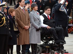 Prime Minister Justin Trudeau and Veterans Affairs Minister Kent Hehr, pictured here at last year's Remembrance Day ceremony in Ottawa, will visit a local legion following the official opening of a new veterans service office in Sydney.