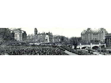 Sun. May 21, 1939, saw 100,000 eager Canadians, straining for a glimpse of King George VI and Queen Elizabeth, gathered in spring sunshine for the National War Memorial's dedication. The King described the Memorial as symbolizing a great truth: 'Without freedom there can be no enduring peace, and without peace no enduring freedom.'