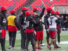 The D-Line go over the play as the Ottawa Redblacks practice at TD Place with the team preparing to face the Edmonton Eskimos in the CFL Eastern Final on Sunday.