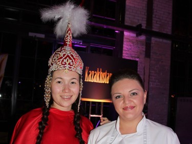 The Kazakh Embassy participated for the second time in the 3rd annual Embassy Chef Challenge on Nov. 3 at the Horticultural Building at Lansdowne Park. The event is held to support the IBD Foundation. From left, Arai Yergazy, assistant to the Kazakh consul, and Anastasia Pristanskaya, the Kazakh Ambassador's chef with a plate she calls "trio of autumn colours of Astana.