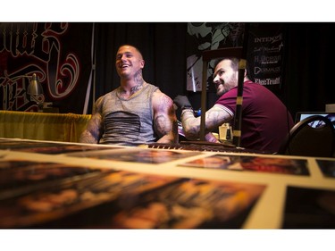 Dave Paulo of Portugal was working on a portrait of a woman on Corey Armstrong Saturday afternoon at the Ottawa Gatineau Tattoo Expo at the Hilton Lac-Leamy. The expo runs through the weekend.