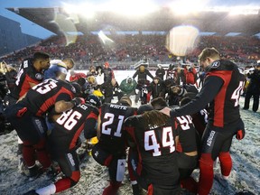 The Ottawa Redblacks and the Edmonton Eskimos say a prayer after the CFL's East Division Final held at TD Place in Ottawa, November 20, 2016.