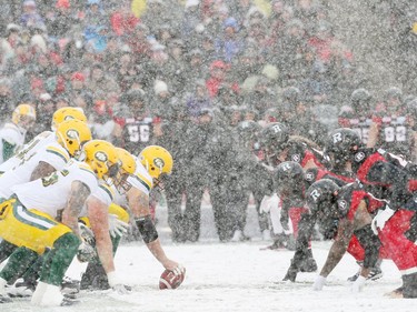 The Ottawa Redblacks battle in the snow against the Edmonton Eskimos during first half of the CFL's East Division Final held at TD Place in Ottawa, November 20, 2016.  Photo by Jean Levac  ORG XMIT: 125313