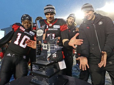 The Ottawa Redblacks celebrate their team's CFL's East Division Final victory against the Edmonton Eskimos during second half of the held at TD Place in Ottawa, November 20, 2016.