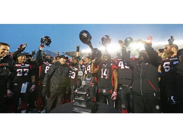 The Ottawa Redblacks celebrate their team's CFL's East Division Final victory against the Edmonton Eskimos during second half of the held at TD Place in Ottawa, November 20, 2016.