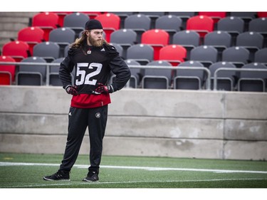 The Ottawa Redblacks had a walkthrough practice at TD Place on Saturday, Nov. 19, 2016. Tanner Doll stands on the field before practice begins.