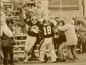 Tony Gabriel of the Ottawa Rough Riders gets mobbed after scoring the game winning touchdown in the 1976 Grey Cup at Exhibition Stadium in Toronto. The Ottawa Redblacks hope to create another moment in time — on a field that stands where Exhibition Stadium was.
