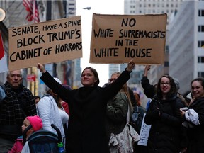 Protesters gather in front of Trump Tower on Sunday in New York.