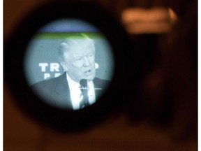 Republican presidential nominee Donald Trump is seen through a TV camera eyepiece as he speaks at a private gathering in King of Prussia, Pennsylvania on November 1, 2016. /