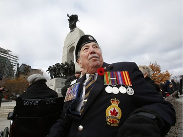 Veteran Bill McLachlan, a wwII radar technician, at the National War Memorial on Remembrance day.