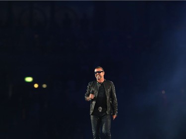 Singer George Michael performs during the Closing Ceremony on Day 16 of the London 2012 Olympic Games at Olympic Stadium on August 12, 2012 in London, England.
