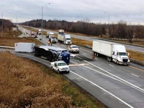A section of Highway 401 was reduced to one lane near Lancaster after a tractor trailer overturned on the eastbound on-ramp early Friday morning in South Glengarry Township.