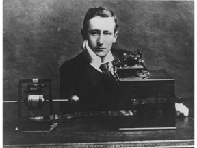 Italian inventor and physicist Guglielmo Marconi is shown with his wireless telegraph.