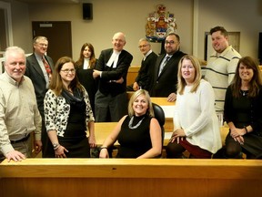 A new drug court has been set up in Perth. The main players include (from left): probation/parole officer Jim Stienberg; Federal Crown Attorney (Lanark County.) John Chalmers; duty counsel, Amy Long; court clerk, Sara MacFarlane; Justice Peter Wright; probation/parole officer, Lisa Carroll; Shawn Souder, Mgr. of Treatment Services for Lanark Leeds Grenville Addictions and Mental Health (LLGAMH); criminal defence lawyer, Mark MacDonald; treatment counsellor, Lisa Muir; treatment case manager, Michael MacKeigan and Provincial Asst. Crown Attorney, Patricia Bowles.