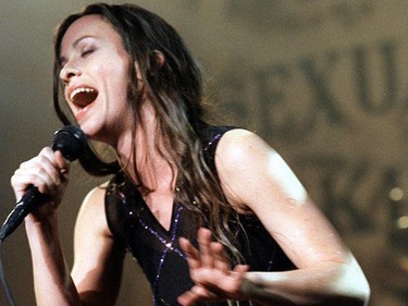 Alanis Morissette during her furious performance at the Hammerstein Ballroom. Rock's avenging banshee returned to claim her loyal audience with an album, 'Supposed Former Infatuation Junkie,' of song therapy: wailing and crooning about all kinds of past turbulence, from eating disorders to crippling depression.