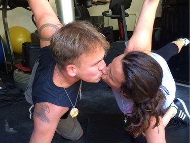 Alanis Morissette with husband Mario "Souleye" Treadway, doing yoga. Alanis.com