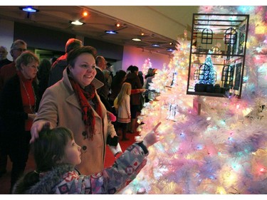 Attendees of A Christmas Carol, which opened at the National Arts Centre on Friday, December 16, 2016, amused themselves with the visual and tactile displays set up outside the theatre.