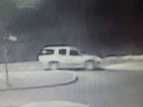 Security cameras caught this image of a suspect car in a Kingston hit and run in which a woman died.