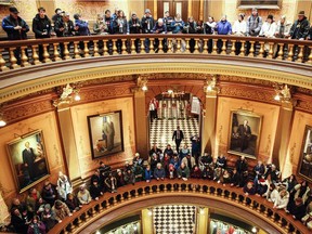 Protesters filled the rotunda of the Michigan State Capitol before the state electoral college met to cast votes on Dec. 19, 2016 in Lansing, Michigan. The electoral college met in the afternoon and voted unanimously for Trump.