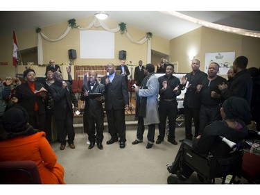 A group of friends and family of the girls came to the front to perform a Swahili song.