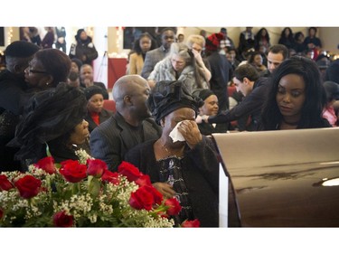 Bibleway Ministries Church was overflowing with family and friends there to support the Muzaliwa family during the funeral for sisters Elizabeth Muzaliwa and  Rehema Muzaliwa Saturday December 24, 2016.   Ashley Fraser/Postmedia