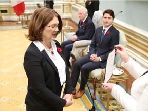 Health Minister Jane Philpott, shown here during her swearing in in 2015, has a tough road to travel with Prime Minister Justin Trudeau when it comes to dealing with the provinces.