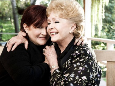Carrie Fisher, left, and Debbie Reynolds at Fisher's house in Beverly Hills, Nov. 27, 2010. HBO will be presenting "Wishful Drinking," Fisher's autobiographical stage production on Dec. 15.