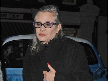 Carrie Fisher visits Chiltern Firehouse in London. On Christmas Eve, just three days after these images were taken Carrie suffered a heart attack on a plane as she flew home to Los Angeles from London.