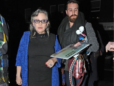 Carrie Fisher visits Chiltern Firehouse in London. On Christmas Eve, just three days after these images were taken Carrie suffered a heart attack on a plane as she flew home to Los Angeles from London.