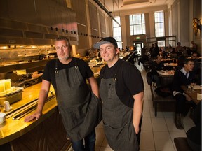 Chefs Matt Carmichael (L) and Jordan Holley prepare a selection of dinner plates for review of Sparks St restaurant "The Riviera".