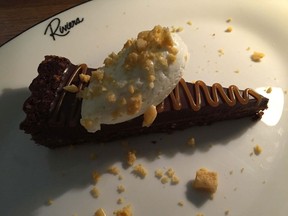 Chocolate peanut butter tart with salted caramel, sponge toffee, and vanilla whipped cream at Riviera.