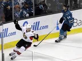 Ottawa Senators' Chris Kelly (22) celebrates past San Jose Sharks defenseman Marc-Edouard Vlasic (44) after Kelly's goal during the third period of an NHL hockey game Wednesday, Dec. 7, 2016, in San Jose, Calif. Ottawa won 4-2.