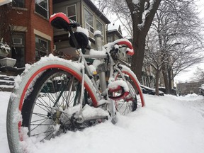 Cyclists woke up to a snowy surprise Saturday as heavy wet flurries hit the capital. Dec, 24, 2016