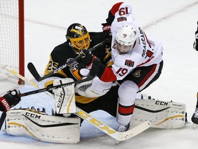 The Ottawa Senators' Derick Brassard collides with Penguins goalie Marc-Andre Fleury in the first period in Pittsburgh on Monday, Dec. 5, 2016. Brassard was penalized for goaltender interference.