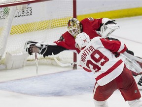 Detroit Red Wings right wing Anthony Mantha (39) scores the overtime game winning goal on Ottawa Senators goalie Mike Condon (1) during NHL action at Canadian Tire Centre on Thursday December 29, 2016.