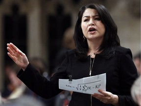 Maryam Monsef Minister of Democratic Institutions stands in the House of Commons during question period on Parliament Hill, in Ottawa, Thursday, December 1, 2016.