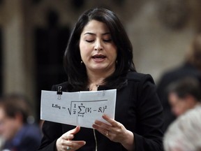 Maryam Monsef Minister of Democratic Institutions stands in the House of Commons during question period on Parliament Hill, in Ottawa, Thursday, December 1, 2016.